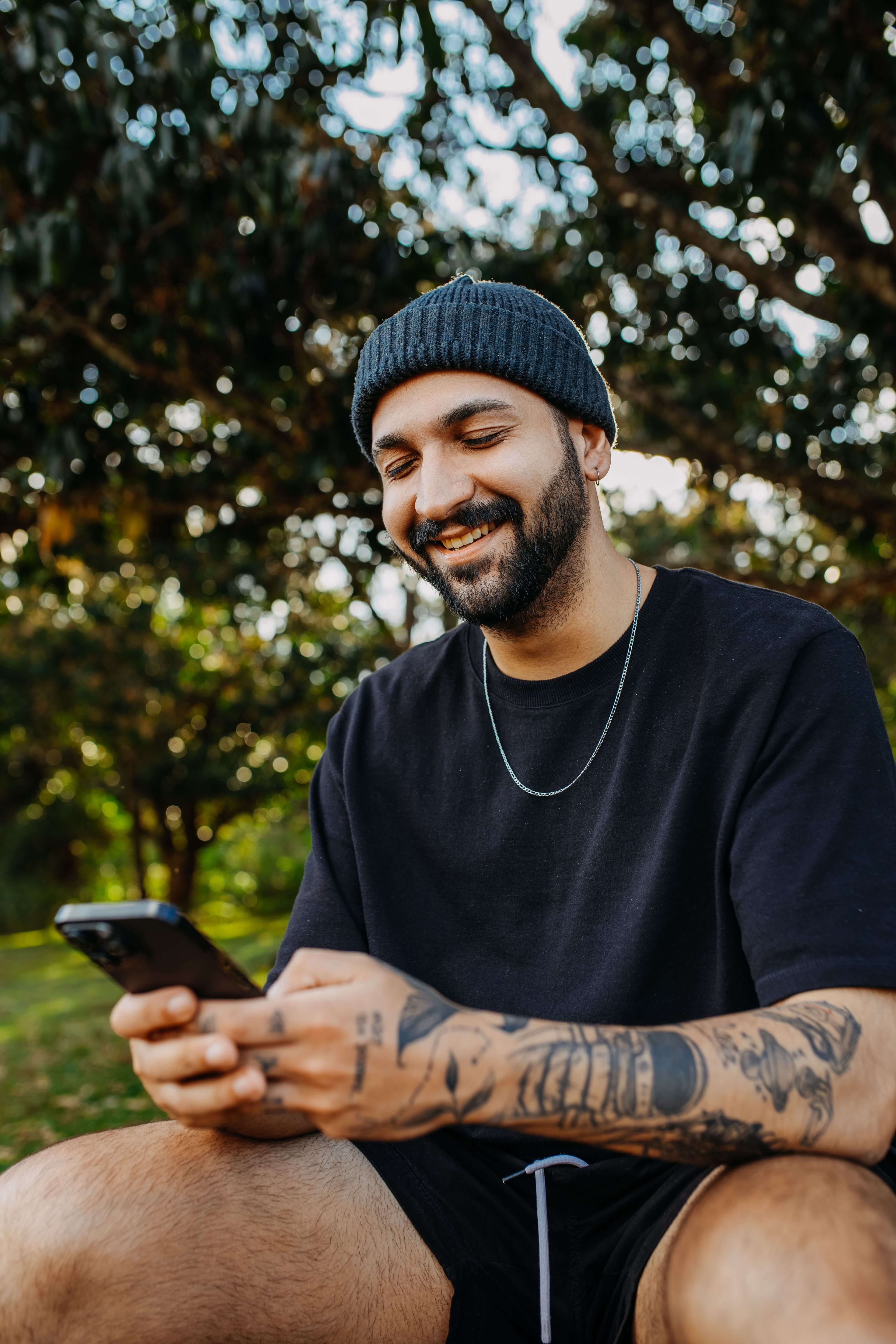 A tradesperson checking an address on a phone at a job